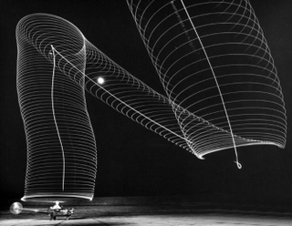 Illustration for article titled Light Paintings That Make the Real World Look like Tron